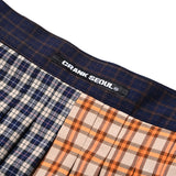 CRANK PLEATS MULTI CHECK ASYMMETRIC SKIRT