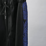 SSERPE BLUE PAISLEY JACQUARD TRACK PANTS BLACK & BLUE